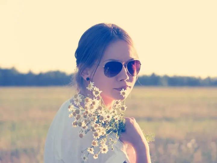 Real photo of a woman holding flowers