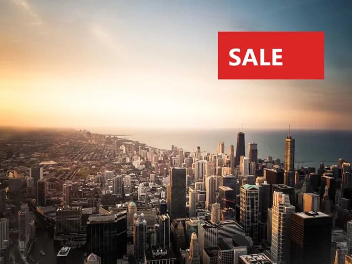 Street photo with a red SALE sticker added